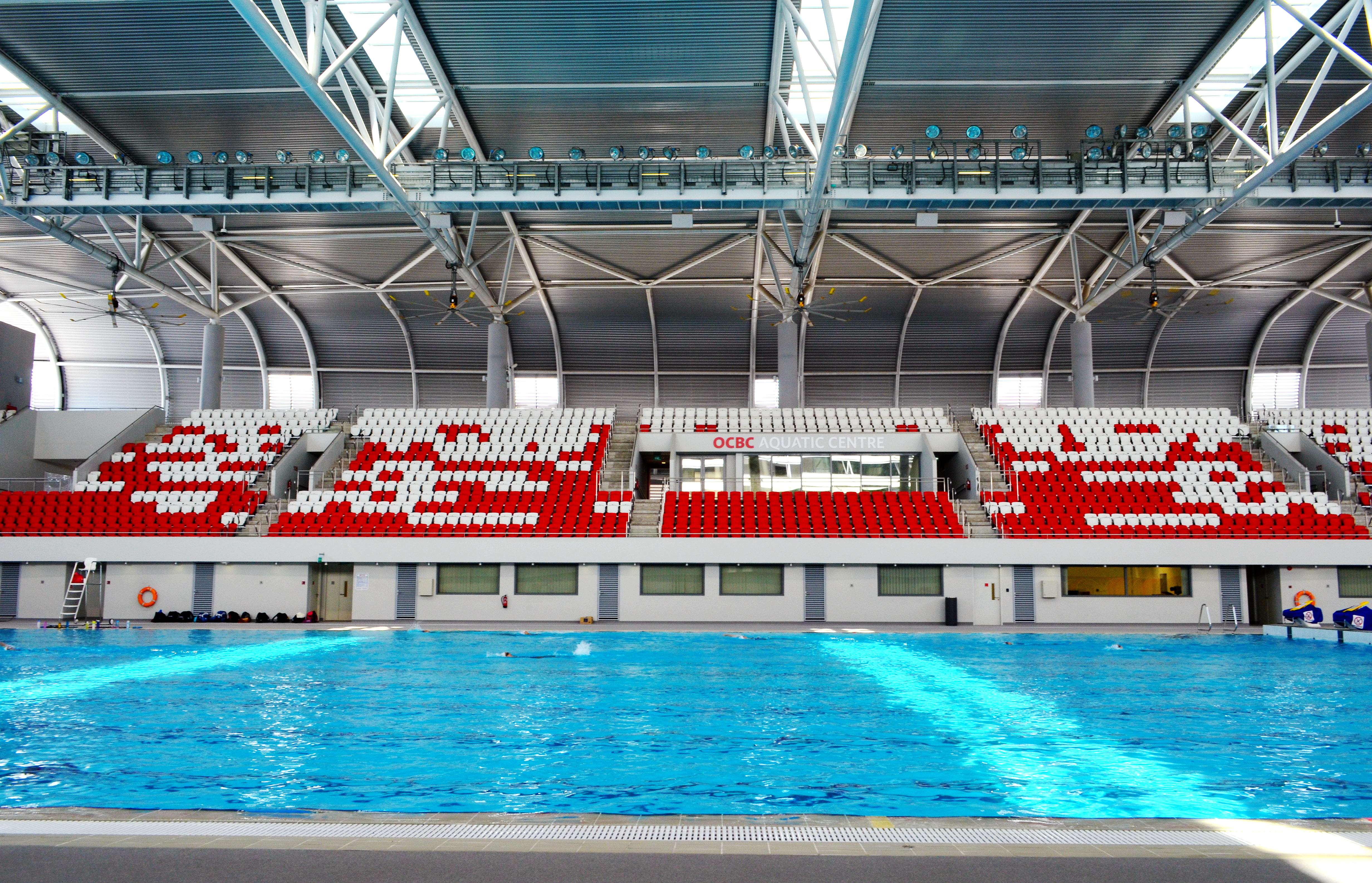 Indoor lap pool and spectator seating at OCBC Aquatic Centre